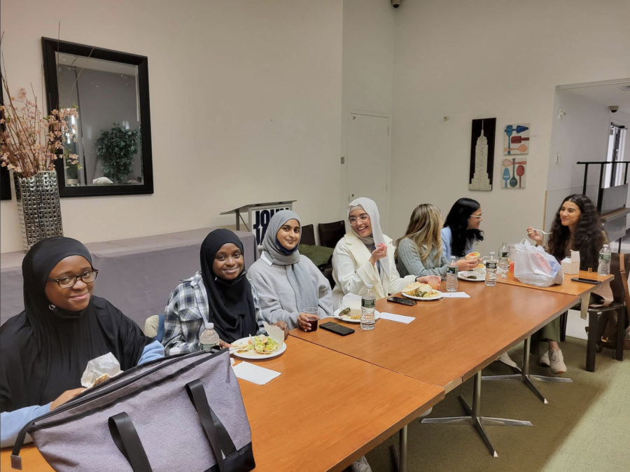 Students gathered at an Iftar dinner hosted by the Honors Program.