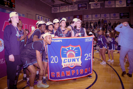 The 2024-2025 John Jay Men's Basketball Team win CUNYAC title 